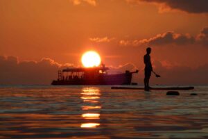 The sun sets over MV Big Blue, one of the boats we use to monitor signs of climate change in oceans.